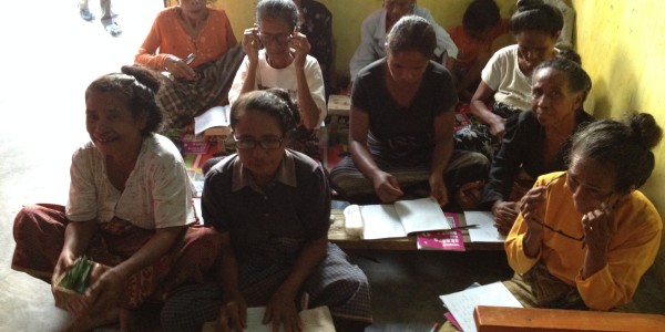 Indonesian women learning to read